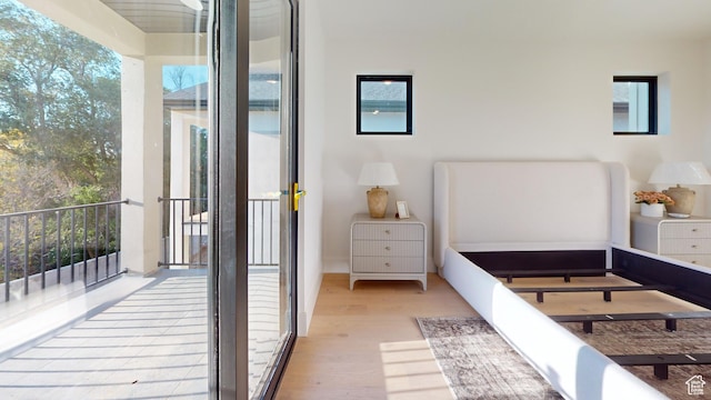 683 N Heritage St, Mapleton, UT 84664 - bedroom with wood finished floors and access to outside