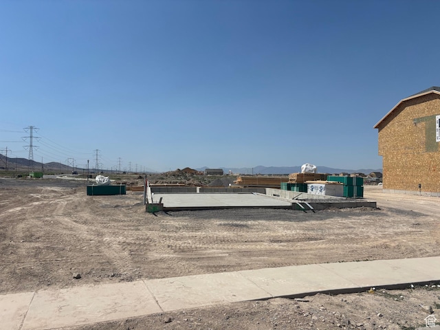 2392 E Woodbury Ln Unit 551, Eagle Mountain, UT 84005 - view of patio featuring a mountain view