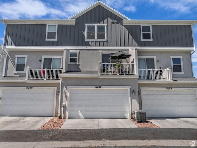 5251 W Linley Ct, Herriman, UT 84096 - multi unit property featuring a garage, stucco siding, board and batten siding, and a balcony