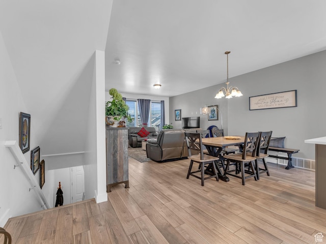 5251 W Linley Ct, Herriman, UT 84096 - dining room featuring light wood-style flooring and a chandelier