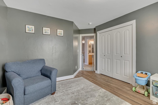 9209 N Prairie Dunes Way, Eagle Mountain, UT 84005 - sitting room featuring wood finished floors and baseboards