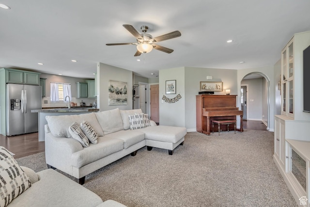 9209 N Prairie Dunes Way, Eagle Mountain, UT 84005 - living room featuring arched walkways, ceiling fan, and recessed lighting