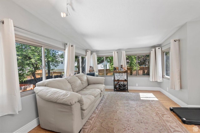 1543 E Spring Run Dr, Salt Lake City, UT 84117 - sunroom featuring wood finished floors and baseboards