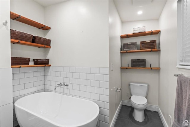 1543 E Spring Run Dr, Salt Lake City, UT 84117 - bathroom with a soaking tub, tile patterned flooring, and tile walls