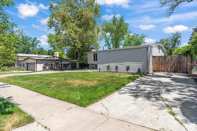 1543 E Spring Run Dr, Salt Lake City, UT 84117 - view of front facade featuring driveway and an attached garage