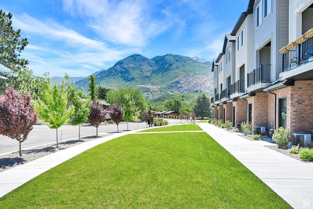 1281 16th St Unit 1281, Ogden, UT 84404 - view of home's community with a mountain view and a lawn