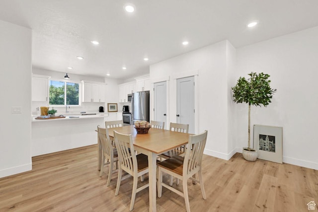 1281 16th St Unit 1281, Ogden, UT 84404 - dining space featuring light wood-style floors and recessed lighting