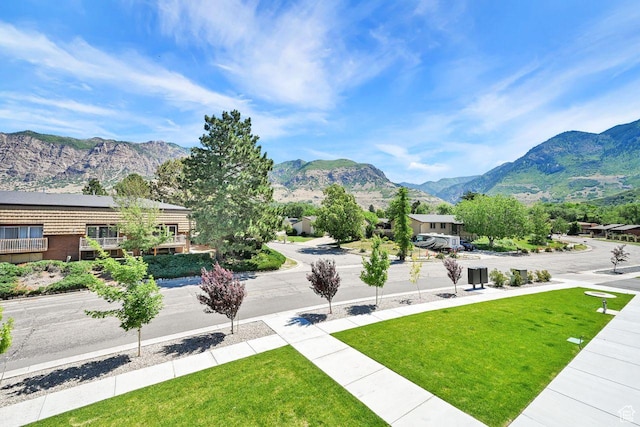 1281 16th St Unit 1281, Ogden, UT 84404 - view of home's community with a mountain view and a yard
