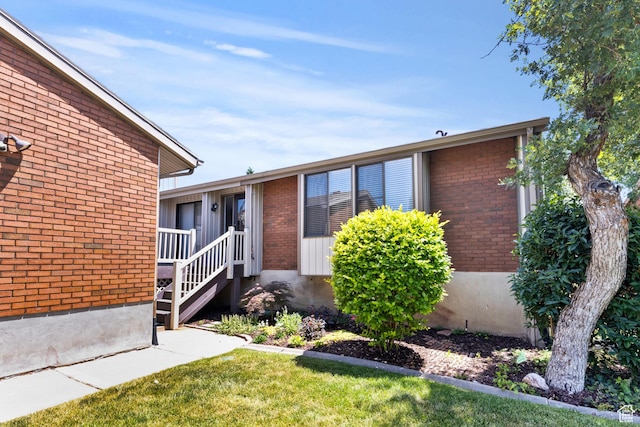 2522 E 1950 N, Layton, UT 84040 - view of front of property with brick siding and a front lawn