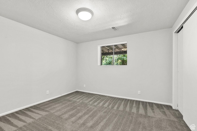 2522 E 1950 N, Layton, UT 84040 - unfurnished room with dark carpet and a textured ceiling