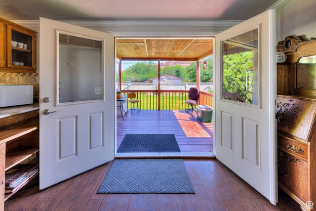 466 W Wingate Ave, Moab, UT 84532 - entryway with dark wood finished floors and crown molding