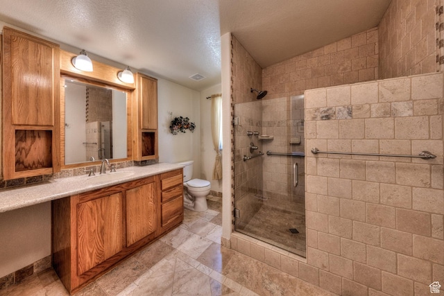 466 W Wingate Ave, Moab, UT 84532 - full bath featuring a shower stall, vanity, and a textured ceiling