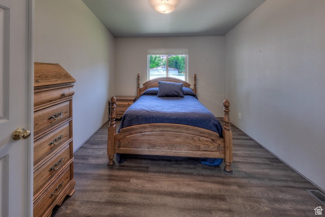 466 W Wingate Ave, Moab, UT 84532 - bedroom with dark wood finished floors