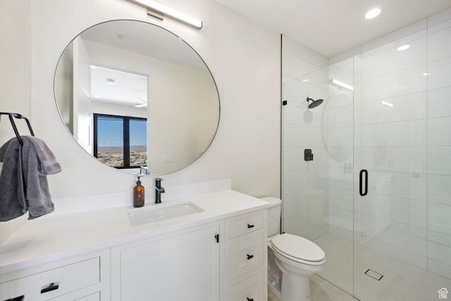 3089 E Banded Hills Dr, St George, UT 84790 - bathroom featuring a shower stall, vanity, and recessed lighting
