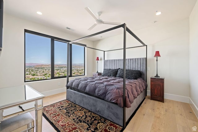 3089 E Banded Hills Dr, St George, UT 84790 - bedroom with light wood-style flooring, recessed lighting, and ceiling fan