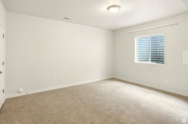 5254 W Burntside Ave, South Jordan, UT 84009 - carpeted empty room featuring a textured ceiling and baseboards
