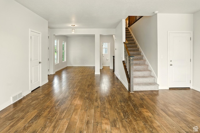 5254 W Burntside Ave, South Jordan, UT 84009 - entryway with stairs and dark wood-style flooring