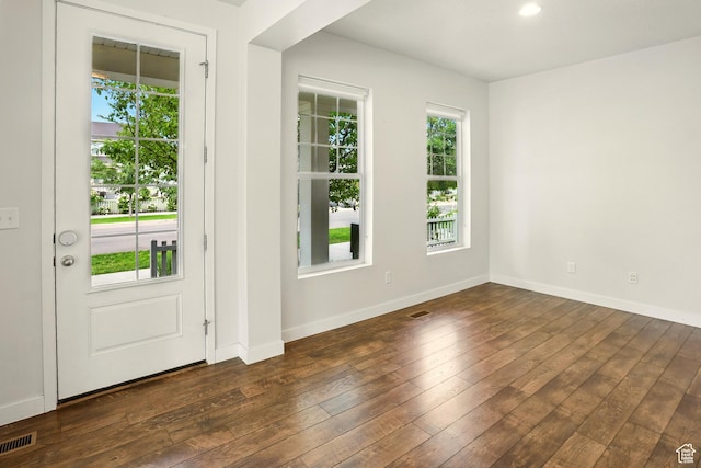 5254 W Burntside Ave, South Jordan, UT 84009 - entryway with dark wood-type flooring and baseboards