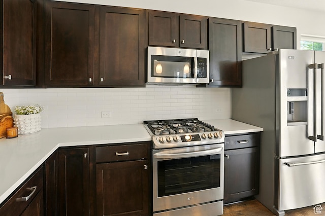 5254 W Burntside Ave, South Jordan, UT 84009 - kitchen with stainless steel appliances, light countertops, and dark brown cabinets