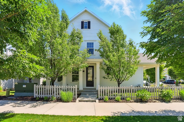 5254 W Burntside Ave, South Jordan, UT 84009 - view of property hidden behind natural elements with a fenced front yard