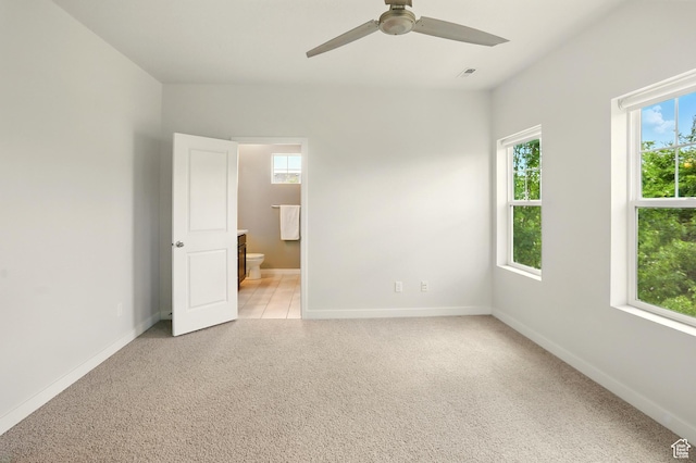 5254 W Burntside Ave, South Jordan, UT 84009 - unfurnished bedroom with light colored carpet, connected bathroom, and ceiling fan