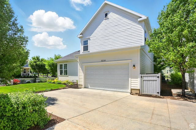 5254 W Burntside Ave, South Jordan, UT 84009 - view of property exterior featuring a garage and concrete driveway