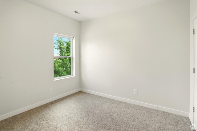 5254 W Burntside Ave, South Jordan, UT 84009 - spare room featuring light colored carpet and baseboards