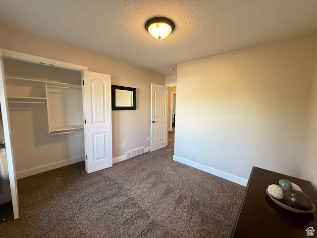 420 N Josephine Ln, Price, UT 84501 - unfurnished bedroom with a textured ceiling, carpet, and a closet