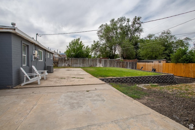 4586 W 4925 S, Kearns, UT 84118 - fenced backyard with a patio area