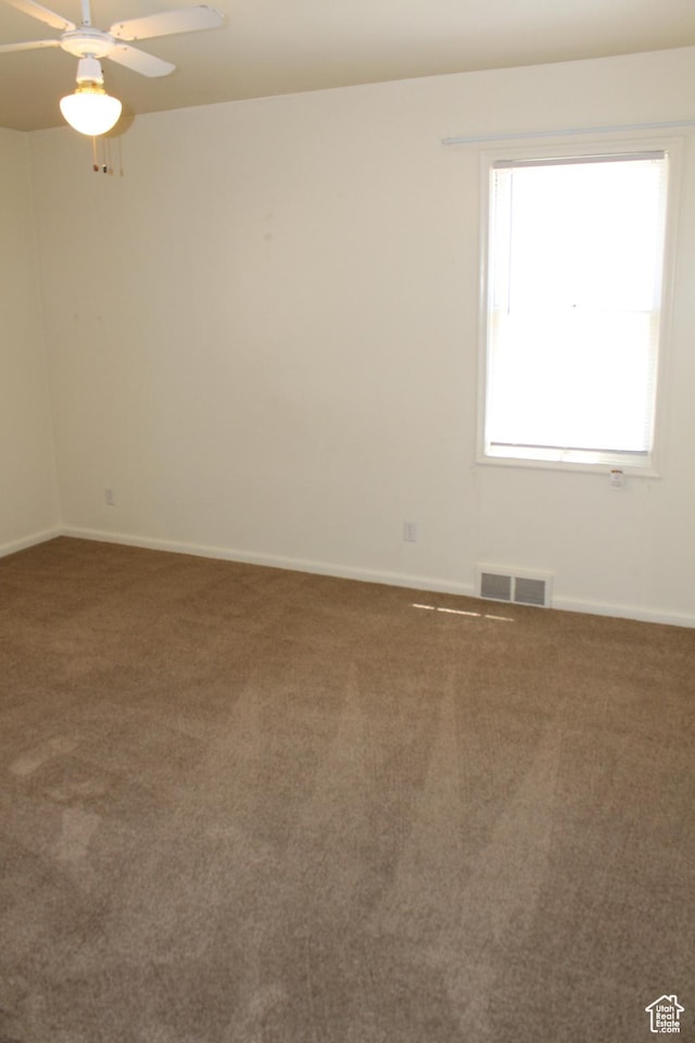 2342 S Van Buren Ave E, Ogden, UT 84403 - empty room with carpet floors and ceiling fan