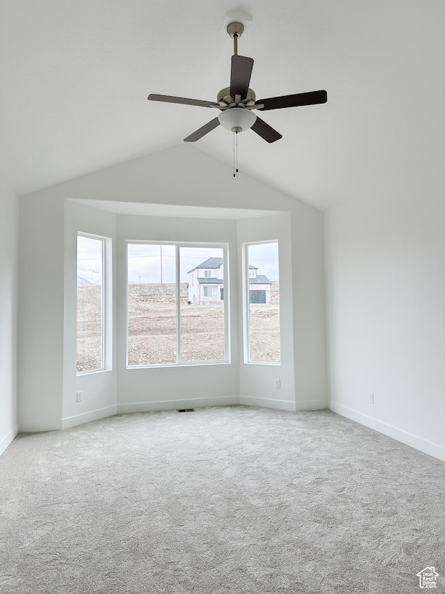 6999 W Hazel Oak Ct, Herriman, UT 84096 - spare room featuring lofted ceiling, carpet floors, and a ceiling fan