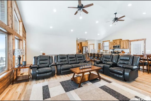 2915 S Golf Course Dr, Garden City, UT 84028 - living area with light wood-style flooring, a ceiling fan, high vaulted ceiling, and recessed lighting
