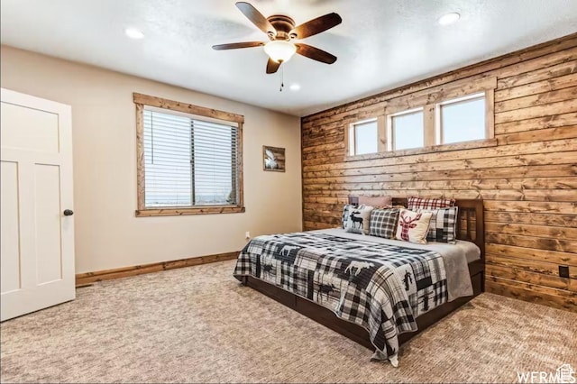 2915 S Golf Course Dr, Garden City, UT 84028 - carpeted bedroom featuring wooden walls, recessed lighting, and ceiling fan