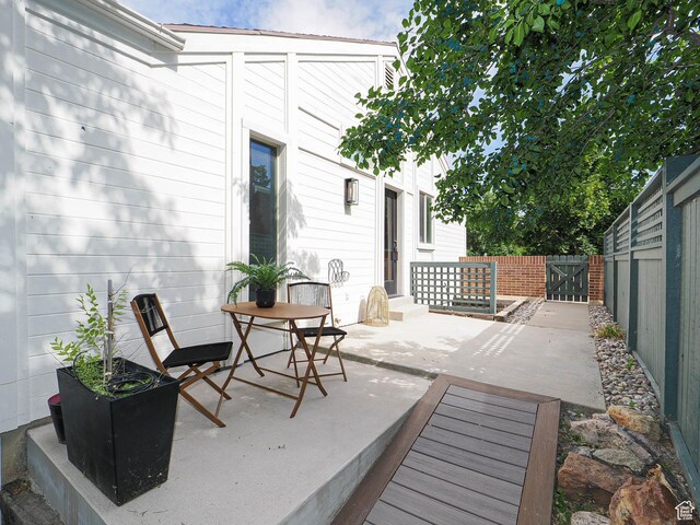 2512 E Redondo Ave S, Salt Lake City, UT 84108 - fenced backyard with a patio area and a gate