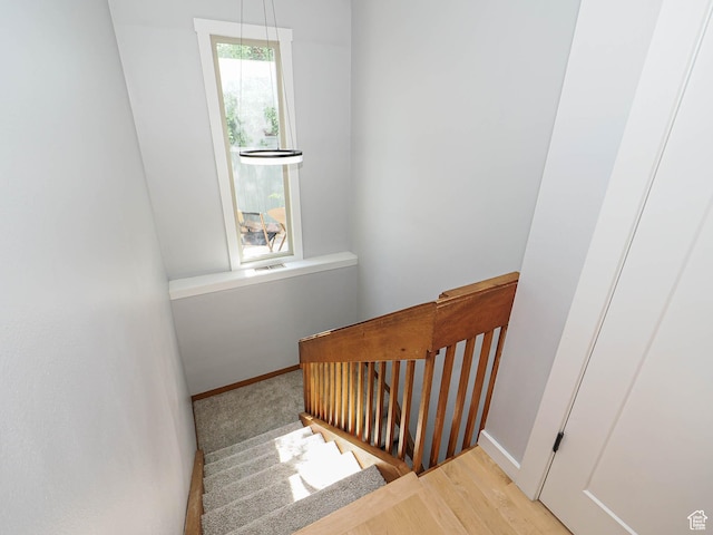 2512 E Redondo Ave S, Salt Lake City, UT 84108 - staircase featuring baseboards and wood finished floors