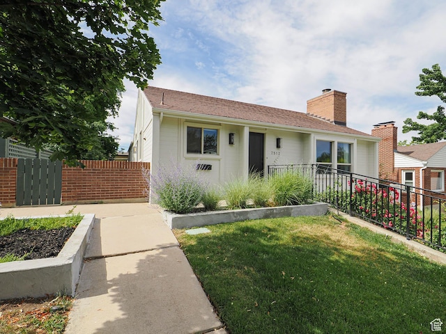 2512 E Redondo Ave S, Salt Lake City, UT 84108 - view of front facade with a chimney
