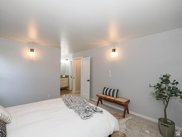 2512 E Redondo Ave S, Salt Lake City, UT 84108 - bedroom with light colored carpet and ensuite bathroom
