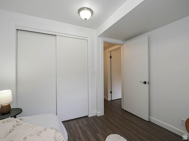 2512 E Redondo Ave S, Salt Lake City, UT 84108 - bedroom with dark wood-type flooring and a closet