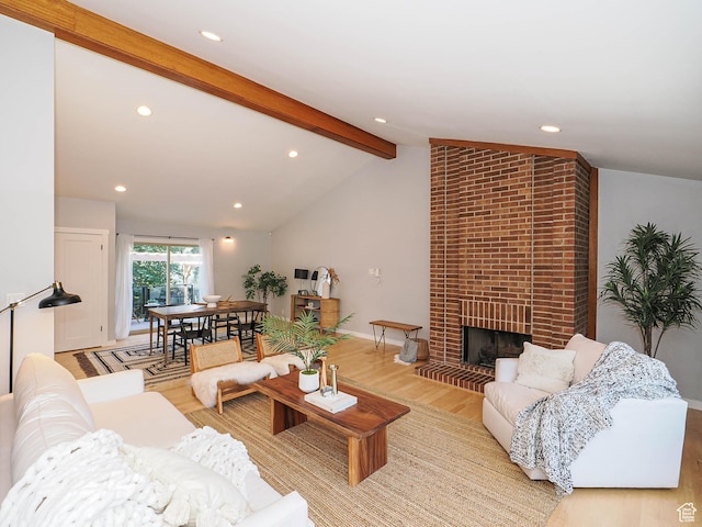2512 E Redondo Ave S, Salt Lake City, UT 84108 - living room with light wood-style floors, recessed lighting, and a brick fireplace