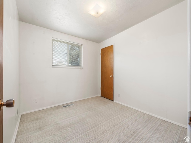 3340 S 2000 W, West Valley City, UT 84119 - spare room with light carpet and baseboards
