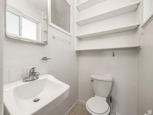 3340 S 2000 W, West Valley City, UT 84119 - bathroom featuring a sink and toilet