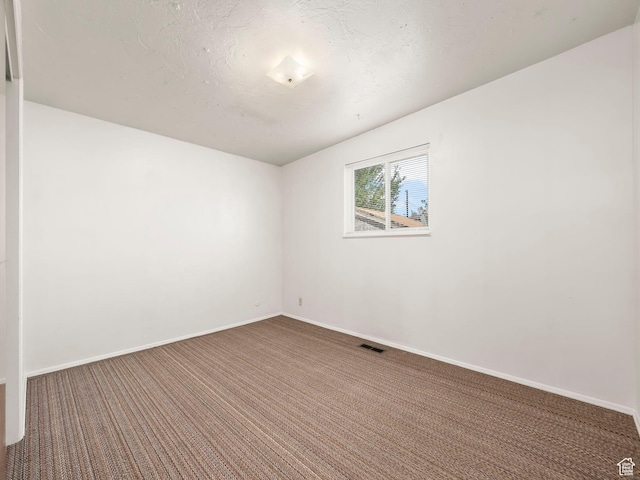 3340 S 2000 W, West Valley City, UT 84119 - carpeted empty room featuring baseboards