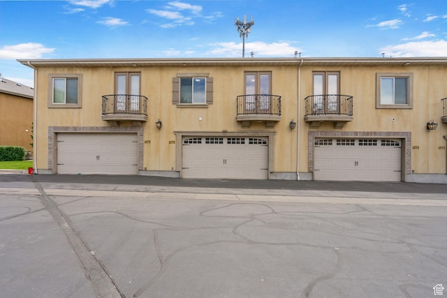 998 W 950 N, Orem, UT 84057 - townhome / multi-family property with a balcony, french doors, and stucco siding