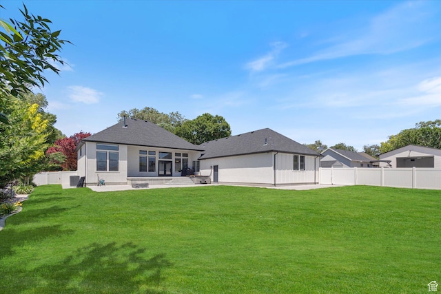 11989 S 3600 W, Riverton, UT 84065 - rear view of house featuring a patio area, a sunroom, and a shingled roof