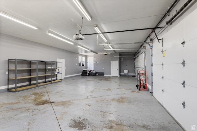 11989 S 3600 W, Riverton, UT 84065 - garage with a garage door opener and baseboards