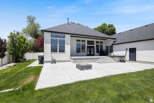 11989 S 3600 W, Riverton, UT 84065 - rear view of property featuring an outdoor fire pit, a patio area, stucco siding, and french doors