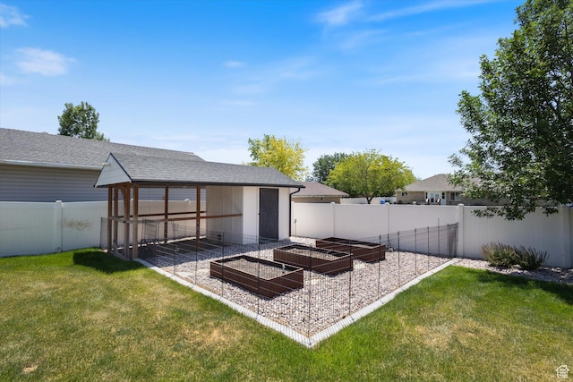 11989 S 3600 W, Riverton, UT 84065 - fenced backyard with a vegetable garden