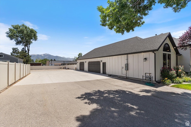 11989 S 3600 W, Riverton, UT 84065 - garage featuring a mountain view