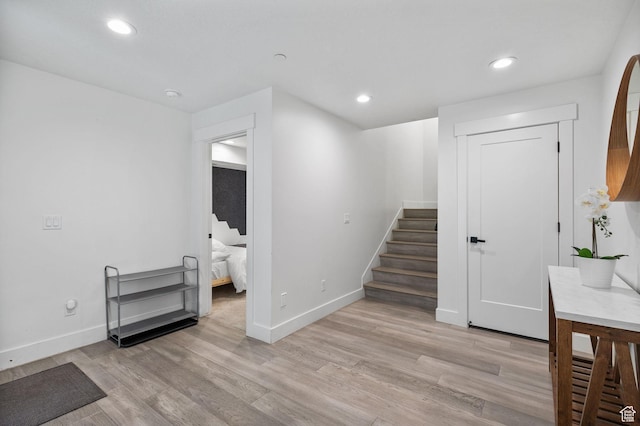 615 E 100 S Unit 1, Salt Lake City, UT 84102 - staircase with wood finished floors and recessed lighting