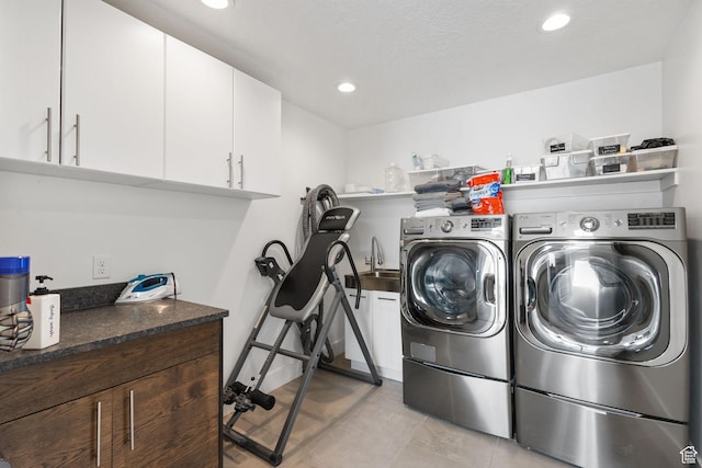 615 E 100 S Unit 1, Salt Lake City, UT 84102 - washroom featuring independent washer and dryer, cabinet space, recessed lighting, and light tile patterned floors